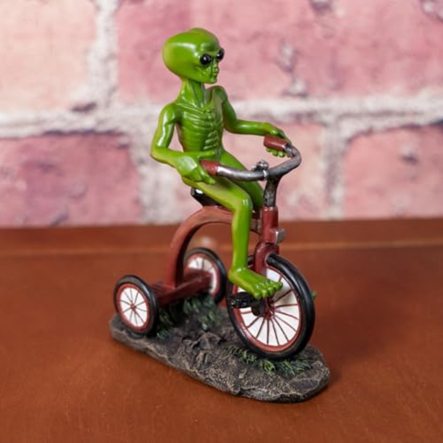 Green Alien Riding Tricycle Figurine Sci Fi Extraterrestrial Alien Go Home Theme 6.7 inch